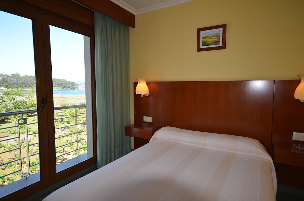 Hotel Maracaibo Portonovo Kamer foto