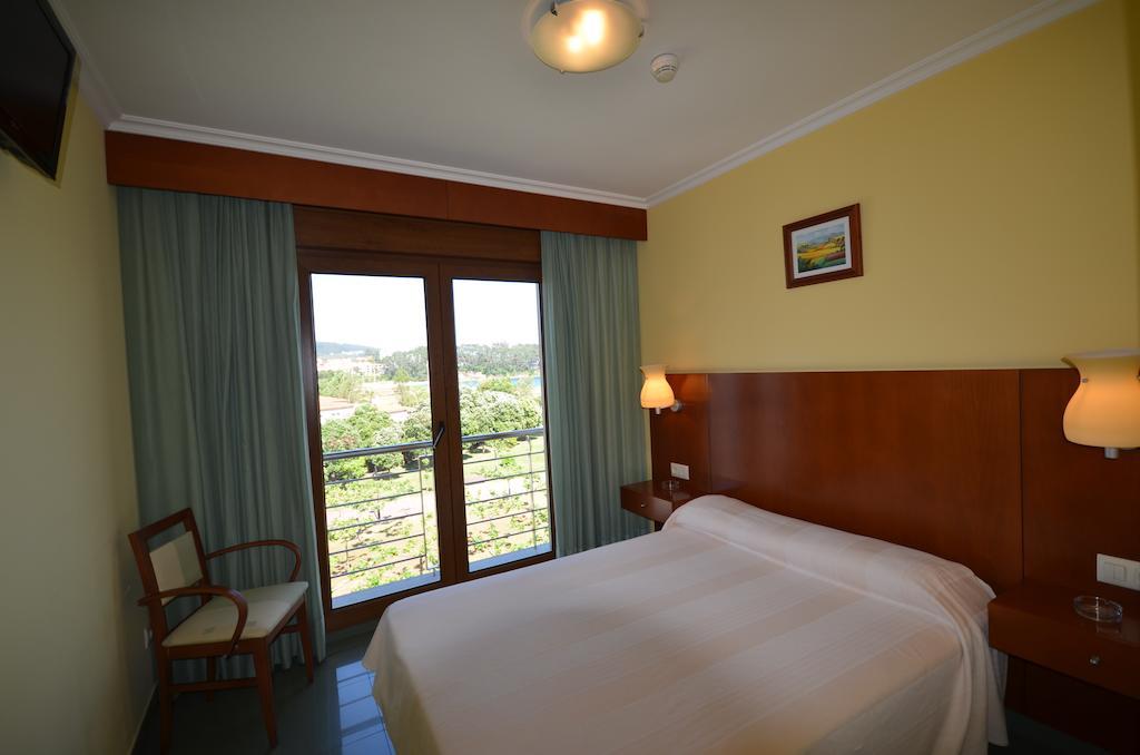 Hotel Maracaibo Portonovo Kamer foto